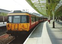303 034 stands at platform 2 of the restored Wemyss Bay station in August 1994.<br><br>[David Panton 31/08/1994]
