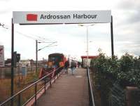 Approach to the platform at Ardrossan Harbour in July 1997. Note the BR double arrow symbol has been crudely painted out pending replacement with the SPT logo.<br><br>[David Panton /07/1997]
