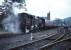 SLS <I>Scottish Rambler No 3</I> Railtour leaving Moffat on 29 March 1964 on the short journey back to Beattock behind BR Standard class 4 no 80118. Moffat station had closed to passenger traffic 10 years earlier.<br><br>[Robin Barbour Collection (Courtesy Bruce McCartney) 29/03/1964]