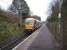 A Wemyss Bay - Glasgow Central service formed by 334 015 pulls up at IBM (opened in 1978 as IBM Halt) in Spango Valley, Greenock, on 1 November 2008.<br><br>[David Panton 01/11/2008]