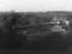 Narrow gauge explosives train, hauled by Ruston 4wDM loco No.7, crossing the Douglas Valley viaduct on the short, two foot gauge, line linking the Nobel's Roburite factory at Shevington with the exchange sidings at Gathurst station in 1978. [See image 21338]. [Apologies for the quality of the picture - I only visited the location once to capture the workings. The viaduct and railway have since been demolished but No. 7 is preserved and has been restored to working order by the Moseley Railway Trust at the Apedale Heritage Centre in Staffordshire] <br><br>[Mark Bartlett 28/11/1978]