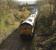 EWS 66201 passing the disused Ashton Gate station, Bristol, on the Portbury Line with a train of coal empties on 24 November 2008<br><br>[Peter Todd 24/11/2008]