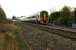 158822 departs north from Abergavenny on 19 November with a service to Holyhead. The length of the northbound platform is almost of Scarborough platform 1 proportions, with 2, 3 and 4 car sets that call here dwarfed!<br>
<br><br>[John McIntyre 19/11/2008]