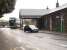 The old station at Windermere has been converted into a supermarket with the original 1847 building, including this covered entrance, happily surviving the metamorphosis.  The line has been cut back only a very short distance and the bus is just leaving the second station on a service for Lancaster.<br><br>[Mark Bartlett 27/11/2008]