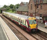 334 038 arrives at Uddingston on 7 June 2007 with a service to Dalmuir.<br><br>[David Panton 07/06/2007]