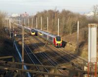 A southbound 5 car Virgin Voyager passes a northbound Pendolino just south of Preston station on 6 January 2009.<br>
<br><br>[John McIntyre 06/01/2009]