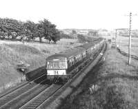 The 1850 Lanark - Glasgow Metro-Cammell DMU approaching Carluke in June 1967.<br><br>[Colin Miller /06/1967]