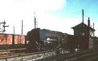 Stanier <I>Coronation</I> Pacific no 46247 <I>City of Liverpool</I> stands alongside Beattock North signal box with the heavy 10am Euston - Perth on 15 April 1963 ready to take on banking assistance.   <br>
<br><br>[Robin Barbour collection (Courtesy Bruce McCartney) 15/04/1963]