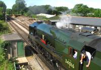 Rebuilt Bulleid West Country Pacific 34016 <I>Bodmin</I> awaits the all-clear from the guard on 9 August 2005 before setting off from Medstead and Four Marks Station on the Mid Hants Railway.<br>
<br><br>[Peter Todd 09/08/2005]