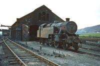 Looking the worse for wear, one of Beattock's final stud of steam bankers, Fairburn 2-6-4T no 42688, stands outside the shed not long before withdrawal in May 1965. The locomotive was cut up at Motherwell Machinery & Scrap, Wishaw, in July of that year.<br>
<br><br>[Robin Barbour collection (Courtesy Bruce McCartney) //1965]