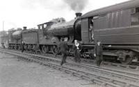 The RCTS <I>Borders Railtour</I> photographed at Jedburgh on 9 July 1961 behind ex-NBR no 256 <i>Glen Douglas</i> and J37 no 64624.<br><br>[Robin Barbour Collection (Courtesy Bruce McCartney) 09/07/1961]