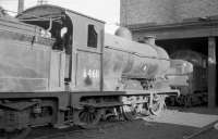 Class J37 no 64611 at Dunfermline shed in the mid 1960s, with one of <I>the new order</I> standing beyond. As the diesels continued to arrive, so the steam locomotives continued to disappear. 64611 was eventually withdrawn in April of 1967.<br><br>[Robin Barbour Collection (Courtesy Bruce McCartney) //]