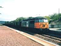 56 112 takes a Hunterston - Longannet coal train north through Rosyth in April 1999.<br><br>[David Panton /04/1999]
