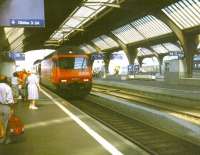An SBBWinterthur-Interlaken train arrives at Platform 13 at Zurich Hauptbahnhof in August 1998. The train reversed here, continuing via Berne to its destination. The coaches are double-deck intercity stock.<br>
<br><br>[Fraser Cochrane /08/1998]