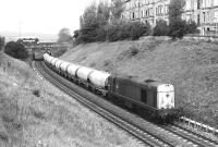 20121 has just passed the site of Gorgie East on the Edinburgh <I>sub</I> in May 1981 and is running south parallel with Hermand Terrace as a bus heads west along Slateford Road in the background.<br><br>[Peter Todd 20/05/1981]