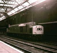 40145 stands below the cross-station walkway alongside the south wall at Edinburgh Waverley station on 13 April 1982. The locomotive is standing on a spot now occupied by platform 10.  <br>
<br>
<br>
<br>
<br>
<br>
<br>
<br>
<br>
<br>
<br>
<br>
<br>
<br>
<br>
<br>
<br>
<br>
<br>
<br>
<br>
<br>
<br><br>[Peter Todd 13/04/1982]