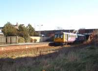 Ansdell and Fairhaven was formerly an island platform with through roads on either side but is now reduced to a single line using the old down side only. Northern Pacer 142015 calls on its way to Blackpool South. <br><br>[Mark Bartlett 07/02/2009]
