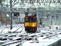 314201 on the snowy approaches to Glasgow Central on 9th February 2009<br><br>[Graham Morgan 09/02/2009]