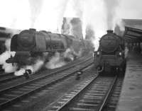 A touch of steam! South end of Carlisle in December 1963 with Black 5 no 45478 having brought an Edinburgh - Birmingham train into platform 4 alongside a pair of Coronation Pacifics standing on the centre road. The Pacifics are 46240 <I>City of Coventry</I>, which will relieve the Black 5 and 46237 <I>City of Bristol</I> waiting to take over the up <I>Royal Scot</I>.<br><br>[Robin Barbour Collection (Courtesy Bruce McCartney) 28/12/1963]