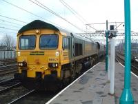 Freightliner 66513 heads north through Carlisle station with coal empties on 19 February 2009.<br><br>[Colin Alexander  19/02/2009]