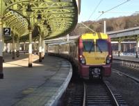 334036 pulls away from platform 2 at Wemyss Bay on a sunny, frosty, January morning with the 1050 service to Glasgow Central.<br><br>[Brian Smith 05/01/2009]