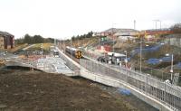 While the second platform at Livingston North has been in use for some time, construction work around the station is far from complete. Wide view showing the general surroundings on Saturday afternoon 7 March as a train for Waverley approaches from Bathgate. <br><br>[John Furnevel 07/03/2009]
