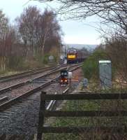 The Spitfire Tours <I>Celtic Growler</I> special passing south through Ladybank on 7 March behind 37676+37606 having arrived off the Perth line. it is abou to cross over to the main up line. (Seen from Heatherinch level crossing.)<br><br>[Brian Forbes 07/03/2009]