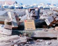 Fairlie Pier (deceased) - dumped on the shore at Largs Marina, Spring 2000 - complete with DANGER sign!<br>
<br><br>[Colin Miller //2000]