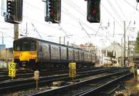 150143, with a class 156 unit leading the 4-car formation, runs into Preston station from the south on 1 March 2009.<br><br>[John McIntyre 01/03/2009]