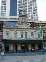 <h4><a href='/locations/B/Brisbane_Central'>Brisbane Central</a></h4><p><small><a href='/companies/Q/Queensland_Railways'>Queensland Railways</a></small></p><p>Brisbane Central Railway Station dwarfed by modern tower blocks, as viewed from Ann Street. The tower was designed by English architect J. J. Clark. 2/5</p><p>23/02/2009<br><small><a href='/contributors/Beth_Crawford'>Beth Crawford</a></small></p>
