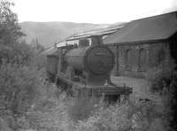 54466 <i>stored</i> alongside Aviemore shed in August 1960. The locomotive was officially withdrawn in 1962, the same year the shed was closed by BR.<br><br>[Robin Barbour Collection (Courtesy Bruce McCartney) 26/08/1960]