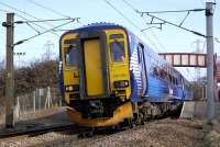 Saltire liveried 156 494 leaves Curriehill with an Edinburgh Waverley - Glasgow Central service on 13 March.<br><br>[Bill Roberton 13/03/2009]