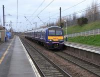 A few tentative daffodils greet passengers arriving at Musselburgh on<br>
322 483 bound for North Berwick on 7 March 2009.  322s are the only  <br>
4-car units in Scotland.  They are also the only ones never paired up in service as they would be too long for platforms. The North Berwick line is again unique in that it has a half-hourly service on Saturday (as here) but only an hourly one Monday to Friday.<br><br>[David Panton 07/03/2009]