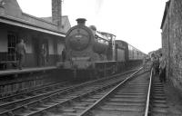 Although the branch was closed to passengers from August 1948, Jedburgh remained open for freight traffic until well into the 60s. The photograph shows J37 no 64624 at the terminus with The RCTS (West Riding Branch) <I>Borders Rail Tour</I> from Leeds City in July 1961.<br><br>[K A Gray 09/07/1961]