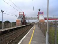 View north at Prestwick International Airport station, or <I>Glasgow Prestwick Airport</I> as the station signage would have it, photographed on 26 February 2009. Coming under the control of the South Ayrshire local authority, this is one of only two stations in Scotland not managed directly by either First ScotRail or Network Rail (the other being the National Express managed Dunbar station).  <br>
<br><br>[David Panton 26/02/2009]