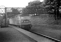 Brush Type 4 no 1968 with a southbound Edinburgh - Birmingham service passing through Riccarton Junction in 1968. The train will rejoin the WCML at Carlisle, having been diverted from its normal route via Carstairs due to engineering activity. <br>
<br><br>[Bruce McCartney //1968]