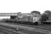 37113 brings a short freight through Burton Salmon Junction from the Castleford direction on 15 August 1980. The lines in the foreground turn south towards Sheffield.<br><br>[Peter Todd 15/08/1980]