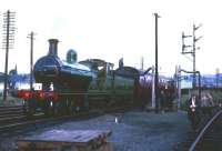 Ex-Great North of Scotland Railway 4-4-0 No 49 <I>Gordon Highlander</I> pauses for refreshment at Bathgate with The Branch Line Society Railtour of 16 October 1965 prior to undertaking the final leg to St Enoch. [Ed note: It would appear that, somewhere between Auchengray and Bathgate on this tour, the third digit of the train reporting number 1Z49 has vanished!]<br><br>[Robin Barbour Collection (Courtesy Bruce McCartney) 16/10/1965]