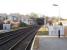 A view west from Dalton station towards the short tunnel beyond which is the junction between the line to Barrow and the direct link to the coast line at Dalton Junction [See image 11905]. The houses occupy the former goods yard.<br><br>[Mark Bartlett 17/01/2009]