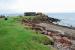 The Corrie Sandstone Quarry Railway, Arran, 1882-1928, ran from the quarry to this harbour, the southernmost in Corrie. The quarry provided stone for various Clyde Coast villas. The photograph is taken standing on the trackbed.<br><br>[Ewan Crawford 25/01/2009]