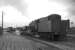 Ex-WD Austerity 2-8-0 no 90463 leaves the Kilmarnock platform at Barassie with a short ballast train in the summer of 1963.<br>
<br><br>[Colin Miller /07/1963]