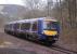 170 418 forms the 1159 Perth-Edinburgh service, just south of Lindores Loch on the Hilton Junction-Ladybank line<br><br>[Bill Roberton 20/02/2009]