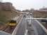 Mount Florida station's island platform and booking office building are seen from the northerly staircase entrance looking towards Cathcart as 314209 calls on its way to Neilston. <br><br>[Mark Bartlett 26/02/2009]