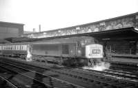 <I>Peak</I> type 4 no 164, arrives at Carlisle platform 4 with the 9.35am Glasgow Central - London St Pancras on 31 December 1968. The train will continue south after attaching through coaches from the 9.30am ex-Edinburgh Waverley.<br><br>[K A Gray 31/12/1968]
