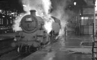 Crew change about to take place on a standard class 4 2-6-4T at Glasgow Central in the late 1950s.<br><br>[K A Gray //]