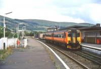Scene at Girvan in 2003 with a northbound train about to leave for Glasgow Central.<br><br>[Andy Kirkham //2003]