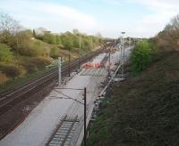 <I>Easter weekend possession</I>. Relaying of Farington Curve Junction has necessitated closure of the Ormskirk, East Lancs and West Coast lines for the holiday period. This view looks south over the junction from Bee Lane bridge. <br><br>[Mark Bartlett 11/04/2009]