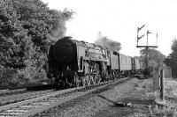 Britannia Pacific 70021 (formerly <I>Morning Star</I>) heads north past Eamont Bridge Junction, approaching Penrith, with a parcels train in September 1967. The locomotive was withdrawn from Kingmoor shed 3 months later and cut up at Wards, Inverkeithing, in April 1968.<br><br>[Colin Miller 25/09/1967]
