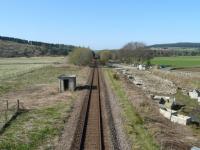 The site of Cairnie Junction looking north towards Grange. The spur to Grange North Junction branched off to the right around where the trees are today.<br>
The line now passes through what was the island exchange platform for the Keith and Moray Coast lines. In it's day the line here was double-track and almost all the area in the foreground would have been occupied by railway lines and sidings.<br><br>[John Williamson 19/04/2009]