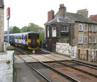A service that has terminated at Knaresborough leaves the arrival platform and runs past the notable stone signal box towards the crossover, prior to running back into the station to start its return journey to Leeds.<br><br>[John Furnevel 24/04/2009]
